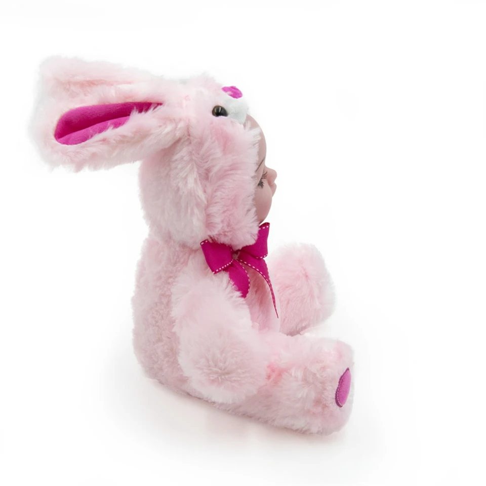 Síró, nevető, beszélő baba óriás szempillával - plüss anyagú nyuszis jelmezben